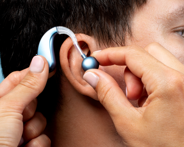 man-wearing-hearing-aids-side-vi (1) (2) man-wearing-hearing-aids-side-vi (1) (2)