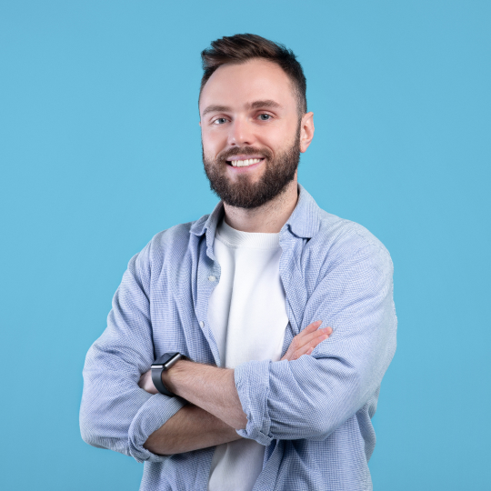 portrait-of-positive-young-guy-posing-with-crossed-2022-12-16-09-18-42-utc-1